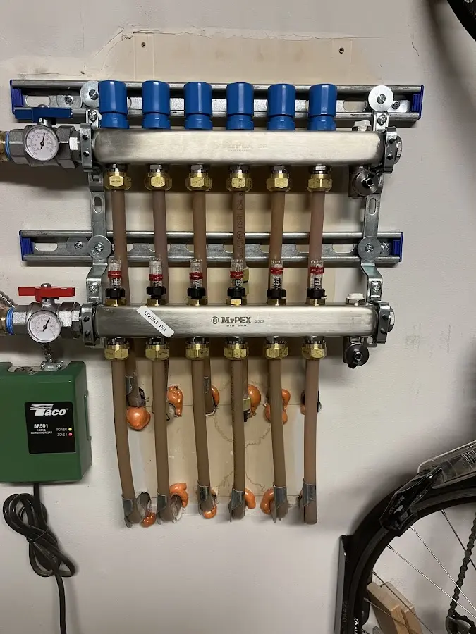 Plumber performing Gas Leak Detection at a residential property in Bettendorf